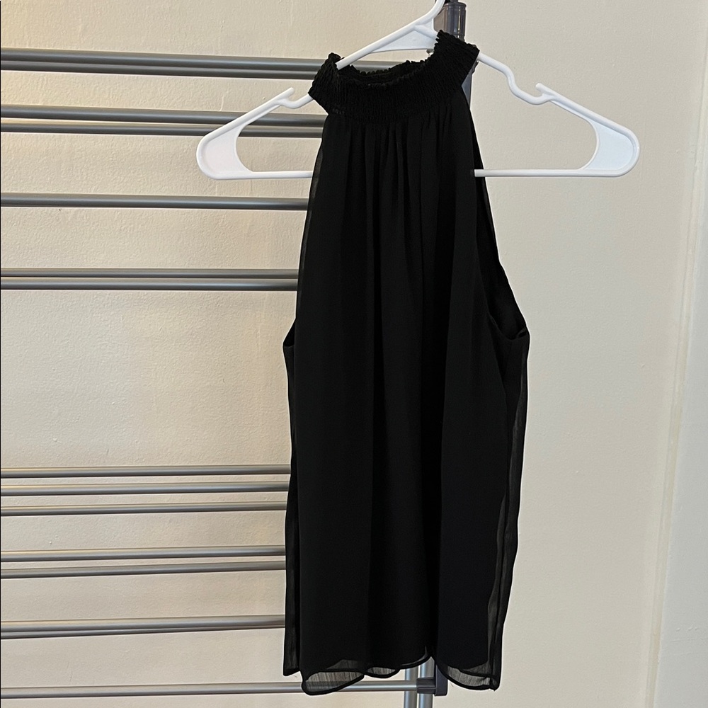 Black sleeveless blouse